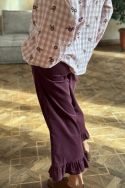 Spodnie sztruksowe w kolorze bordo z falbankami